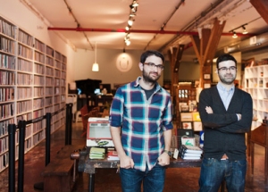 Art House co-founders Steven Peterman and Shane Zucker, at the Brooklyn Art Library. (photograph, Blue Window Creative)