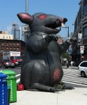 The inflatable critter now marks the corner by the new greenmarket. 