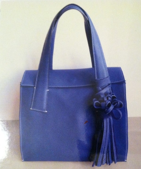 Cobalt blue bag is soft and chic.